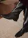 Bota Ivy Cano Longo em Couro Preto